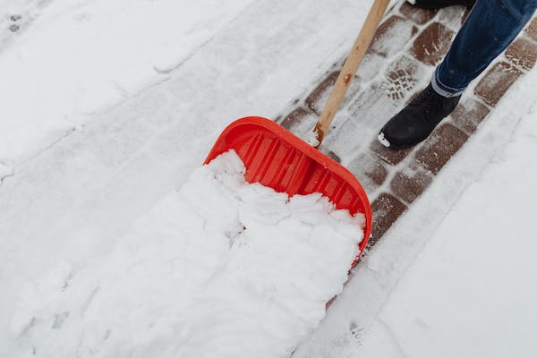 Snow shovel sidewalk